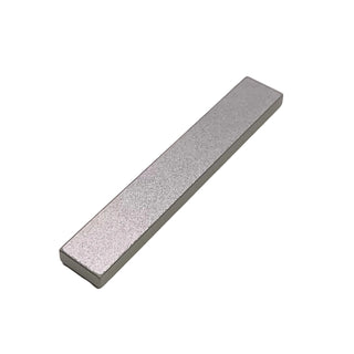 Gray rectangular tile with textured surface and beveled edges, 1x6 proportion.