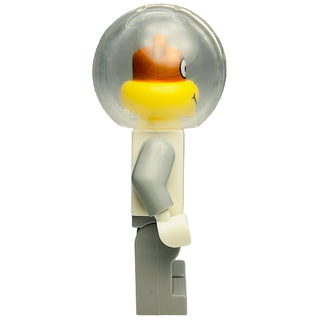 LEGO minifigure with brown hair, yellow torso, tan arms, and gray legs, enclosed in clear dome helmet.