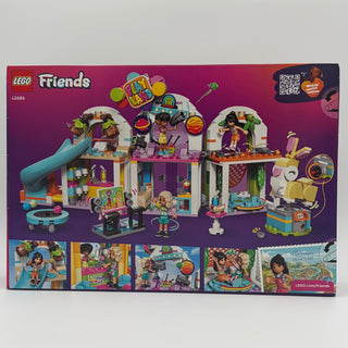 LEGO Friends set 42686 box showing colorful indoor playground playset with slide, minifigure, and activity stations.