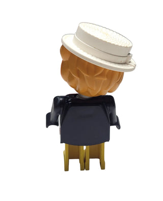 LEGO Fabuland lion figure with tan head, white hat, black jacket, and yellow legs.