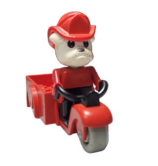 LEGO Fabuland bulldog figure with white face and red hat sitting on red tricycle with cargo cart attachment.