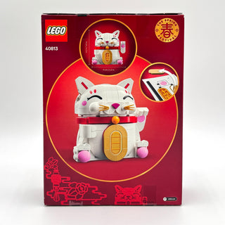 LEGO Lucky Cat set 40813 box showing white and red buildable cat figure with gold coin detail and waving arm mechanism.