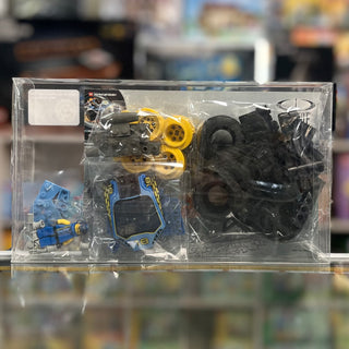 LEGO Racers Nitro Pulverizer set 4585 contents displayed in clear plastic case with yellow and blue race car pieces and minif