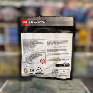 LEGO Technic Gyrocopter paper bag back showing product information, warnings, and certification labels.