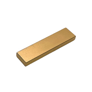 Tan rectangular tile with smooth flat surface and beveled edges, elongated 1x4 proportion.
