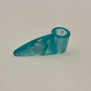 Teal plastic Bionicle gear tooth with cylindrical axle hole on right end.