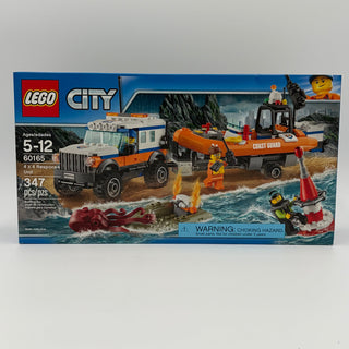 LEGO City 60165 box showing orange and white 4x4 vehicle, orange Coast Guard boat, minifigures, and coastal rescue scene.