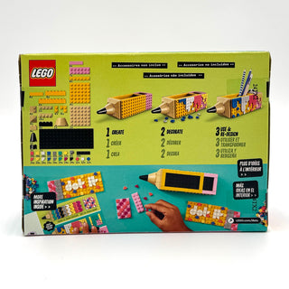 LEGO DOTS pencil holder set box showing colorful dot tiles, assembled holders, and instruction diagrams on green and teal bac