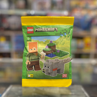 LEGO Minecraft paper bag set featuring Alex minifigure and gray wolf with terrain elements.