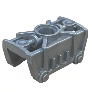 Gray Bionicle Toa Metru knee cover armor piece with cylindrical center opening and articulated side joints.