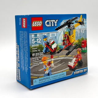LEGO City Airport Starter Set box showing yellow helicopter, red fire truck, and minifigures on tarmac.
