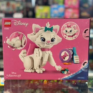 LEGO Disney Aristocats set 43286 featuring buildable Marie cat figure with pink bow and accessories on pink box.