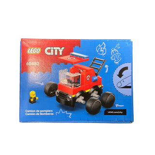 LEGO City fire truck set 60482 box showing red brick vehicle with large wheels and yellow minifigure.