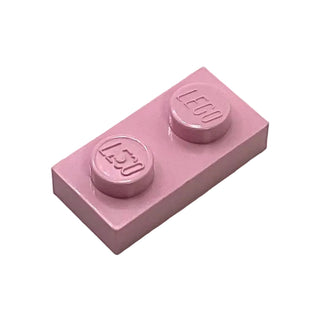 Pink plastic building plate with two studs and LEGO branding.