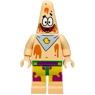 Tan minifigure with conical head, wide smile, gray bib with yellow duck, orange spots, and purple patterned shorts.