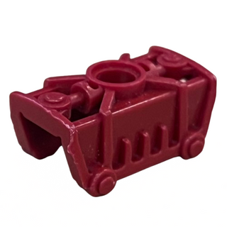 Dark red Bionicle Toa Metru knee cover with cylindrical post and geometric detailing.