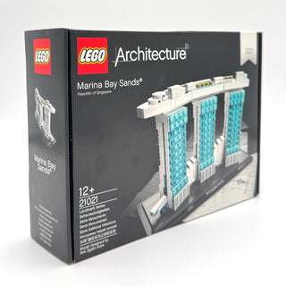 LEGO Architecture set 21021 Marina Bay Sands box featuring white and turquoise building model with three towers on display ba