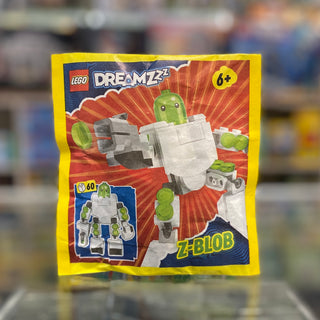 LEGO DREAMZzz Z-Blob Mech set in yellow paper bag with white robot and green character on red background.