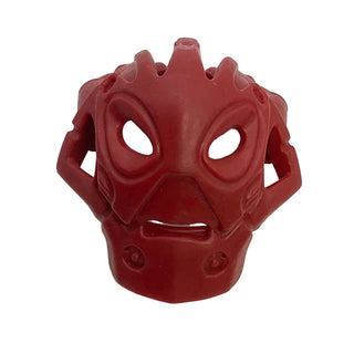 Red Bionicle mask with angular facial features, large oval eye openings, and side attachment points.