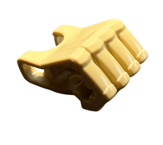 Tan plastic fist with four fingers and axle hole connector port.