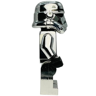 Chrome silver LEGO Stormtrooper minifigure with black and white armor, holding a blaster accessory.