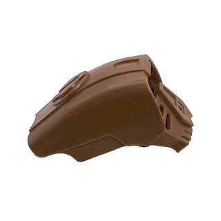 Brown Bionicle Komau mask with ridged side details and curved front panel.