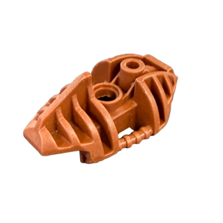 Orange Bionicle Piraka leg armor piece with ribbed details and two circular connection ports.