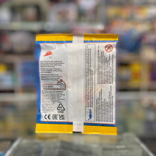 LEGO City paper bag with yellow and blue branding, item number 952305, displaying product information and safety warnings on 
