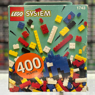 LEGO System set 1743 box containing 400 assorted colored bricks in red, yellow, blue, white, and black.