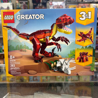 LEGO Creator Fierce Dinosaur set 31379 with red and yellow dinosaur figure, eggs, and bones on package box.