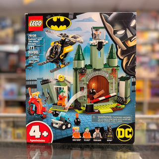 LEGO set 76138 box showing green castle structure, black and yellow helicopter, minifigures, and accessories.