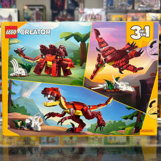 LEGO Creator set 31379 box showing red and yellow dinosaur in three configurations: standing, flying, and walking poses.