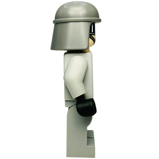 LEGO minifigure with gray helmet, tan face, light gray torso, and black gloved hand.