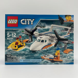 LEGO City Sea Rescue Plane set 60164 box showing white and orange seaplane, yellow rescue boat, and minifigures on water back