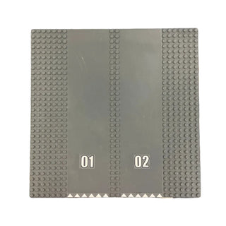 Gray LEGO baseplate with road markings and studs on sides, labeled "01" and "02" in center.