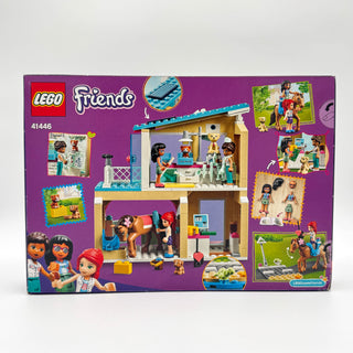 LEGO Friends Heartlake City Vet Clinic set 41446 box showing two-story building with animal examination rooms and minifigures