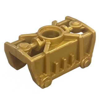Tan molded plastic Bionicle armor piece with central circular socket and side attachment points.