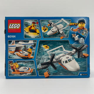 LEGO City 60164 set box back showing white and orange rescue plane, boats, minifigures, and ocean rescue scene.