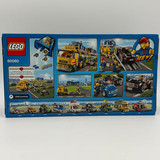 LEGO City set 60060 box back showing yellow auto transporter truck with loading ramp and multiple small vehicles.