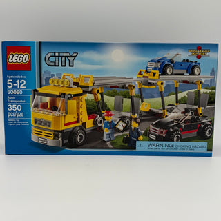 LEGO City Auto Transporter set 60060 box showing yellow truck with extendable trailer carrying blue and red vehicles.