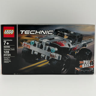 LEGO Technic 42090 Getaway Truck set box featuring black and silver truck with red flame design and pull-back motor feature.