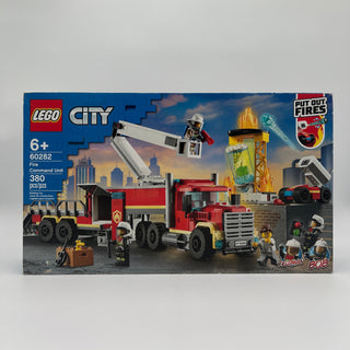 LEGO City Fire Command Unit set box with red fire trucks, crane vehicle, yellow control tower, and minifigures.