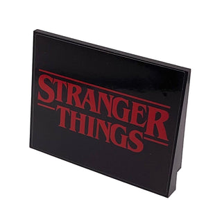 Slope 10 6 x 8 with Red 'STRANGER THINGS' on Black Background Pattern (Sticker), Part# 4515pb058 Part LEGO® Black Very Good