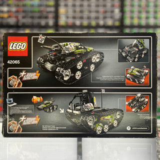 LEGO Technic 42065 RC tracked racer set box showing yellow and black motorized vehicle with tracked treads and remote control