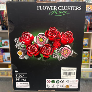 Black product box featuring red and pink flower clusters with silver beads and green leaves, 841 pieces, ages 6+.