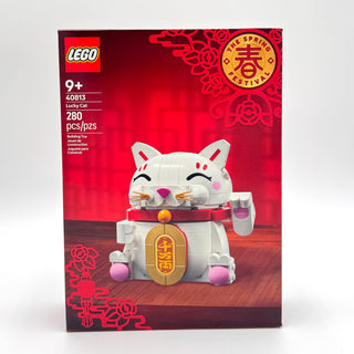 LEGO Lucky Cat building set box with white and red cat figure featuring raised paw and gold charm.
