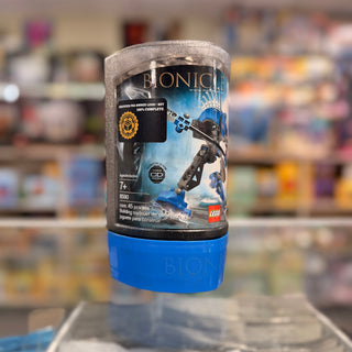 LEGO Bionicle Guurahk set 8590 in cylindrical packaging with black upper section and blue base.