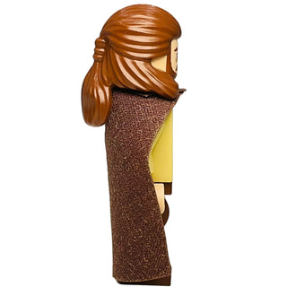 LEGO Star Wars minifigure with light tan head, brown hair with braid, yellow torso, and reddish-brown cape and legs.