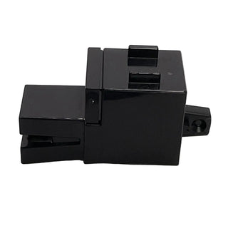 Black LEGO Minecraft dragon head with rectangular printed tile piece attached to the side.