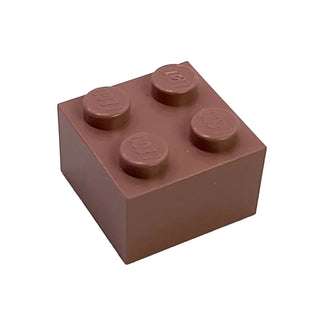 Brown plastic construction brick with four studs on top surface.